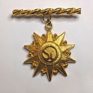 Vintage St. John Gold-Tone Sunburst Medal Brooch
